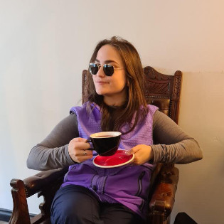 Picture of Nina drinking a cup of tea